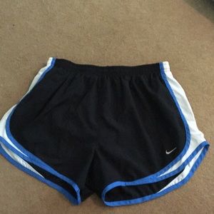 Black Nike running shorts